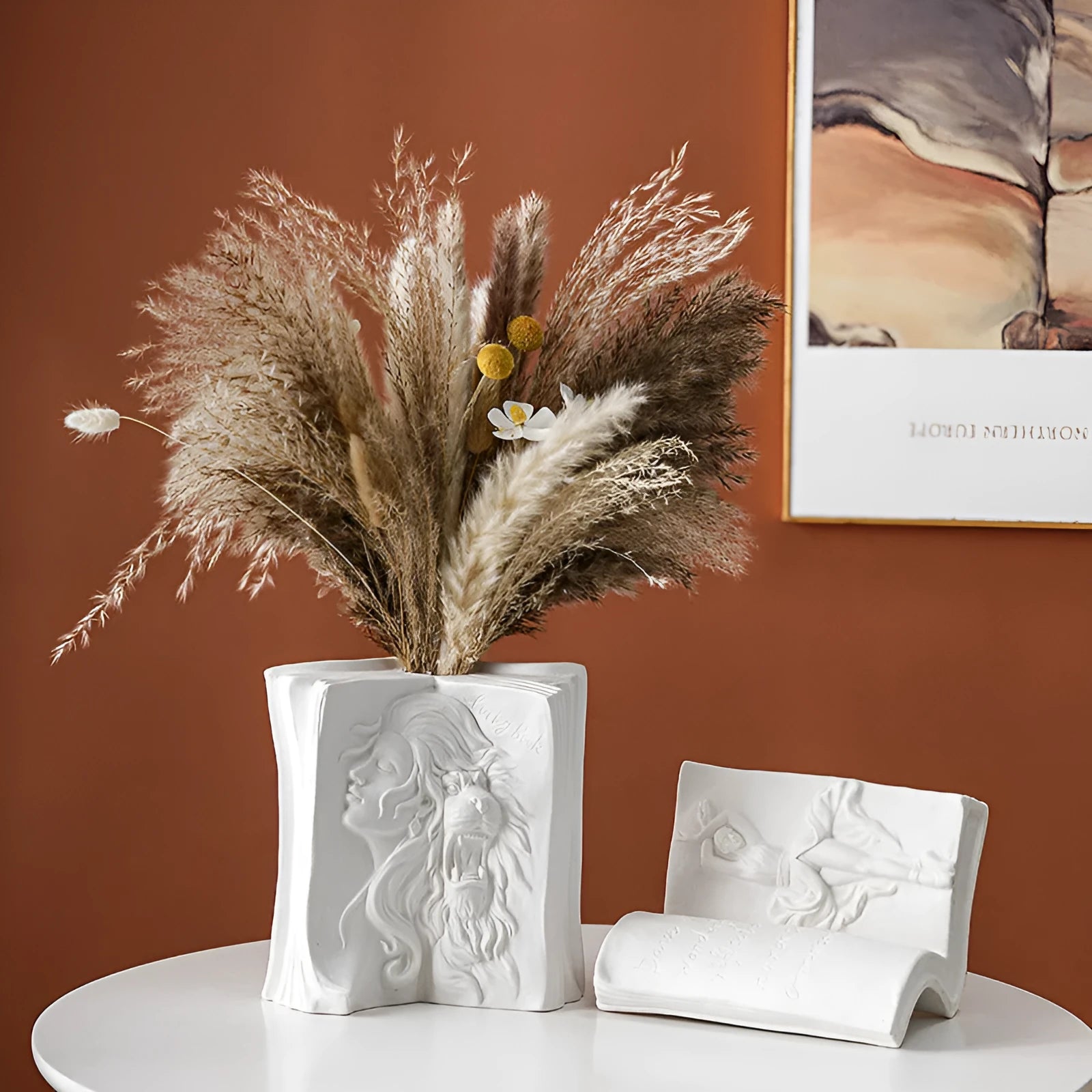 Ceramic decorative book stand in a modern simplicity style on a wooden desk.