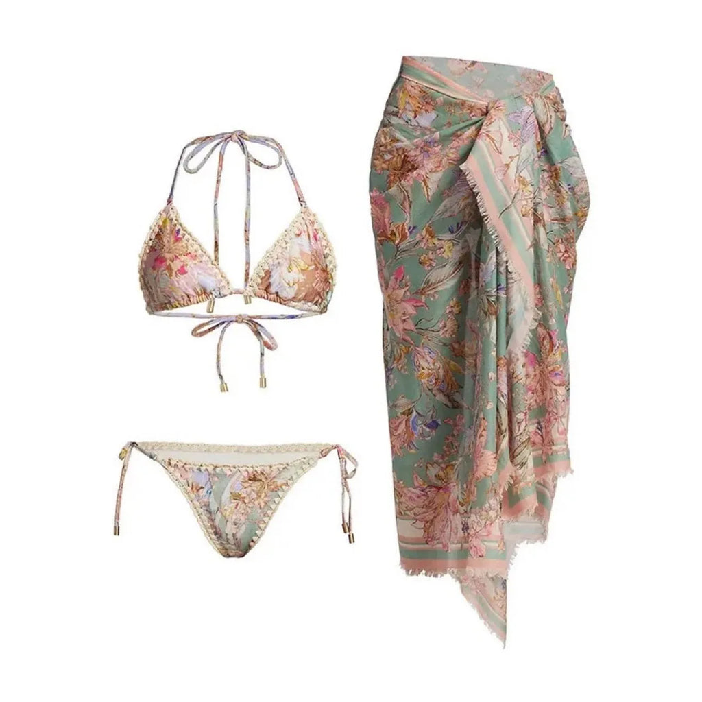 Women's creamy-white floral bikini set with removable skirt on size label