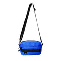 Men's street style nylon messenger bag in crossbody configuration with sewing thread detailing