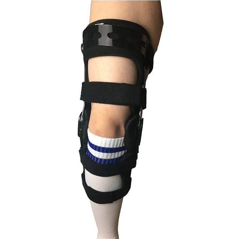 Black anterior ligament knee pad with metal hinge brace, showing left and right leg sizes.