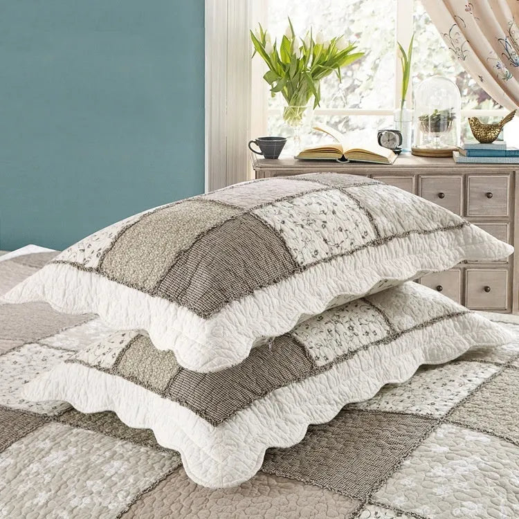Pure cotton quilted bedspread and pillowcase set in a Korean style on a bed.