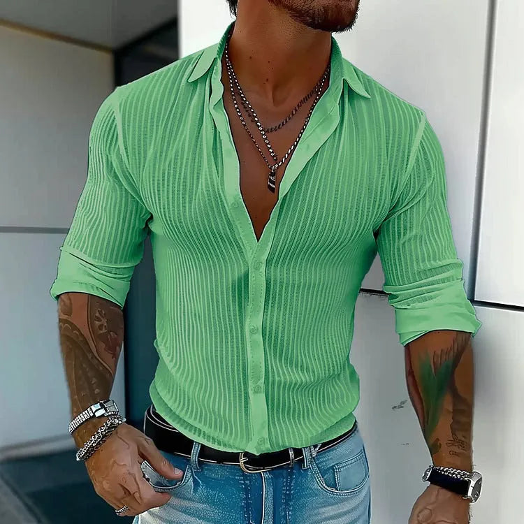 Man wearing a loose-fit, striped, long-sleeve cardigan in a blue colour variant