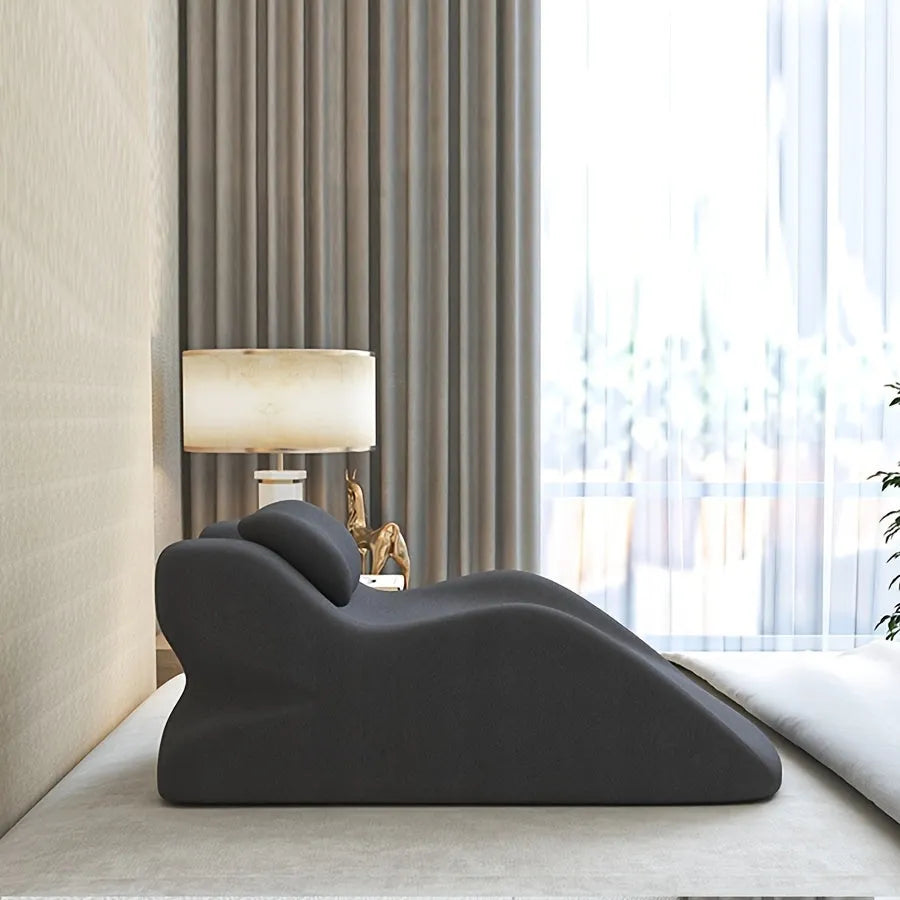 Stomach sleeping pillow for reading in bed shown in blue colour option