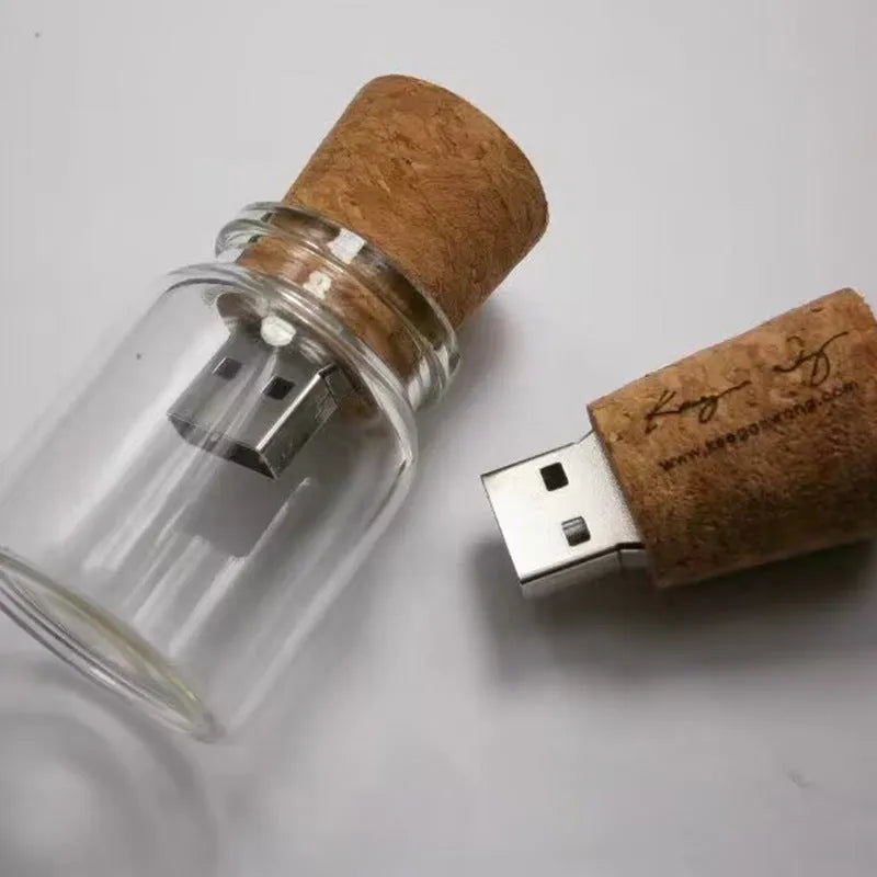 Transparent wooden wish drift bottle shaped USB flash drive on white background.