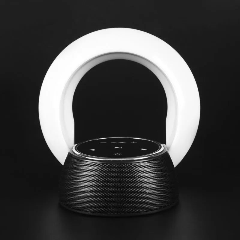 Blue folding Bluetooth desk lamp speaker with subwoofer and touch controls for adjustable LED lighting.