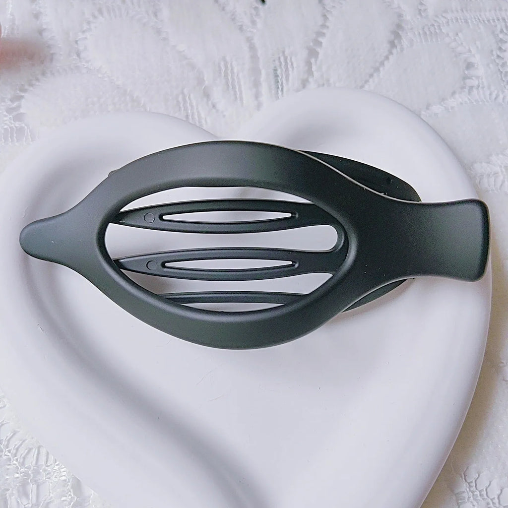 Set of six nude-coloured plastic women's hair clips with frosted grip and pointed toe design