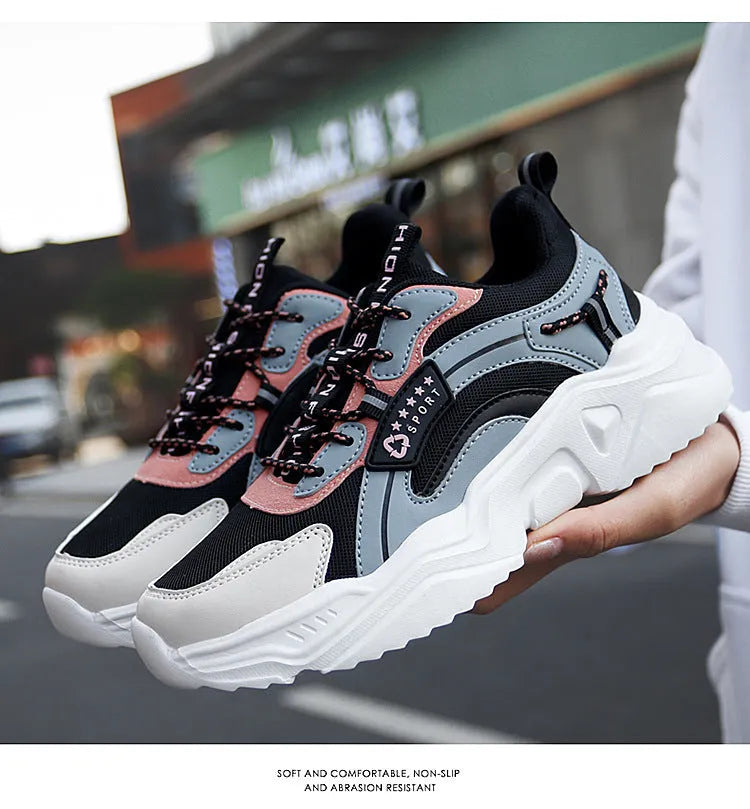 White women's casual sports shoes with mesh upper, thick PU sole, and lace closure.