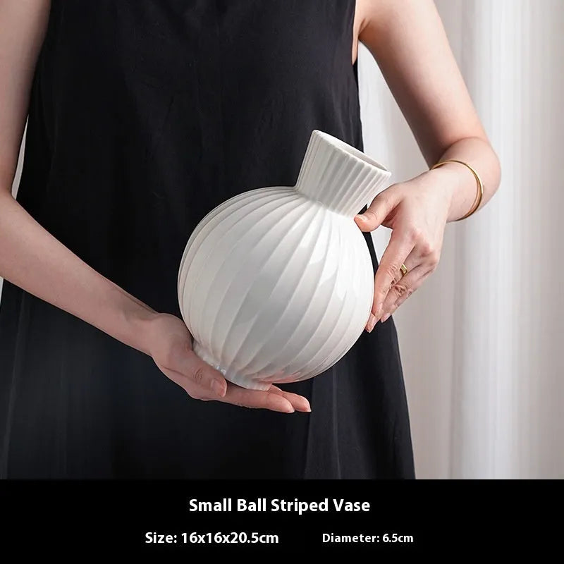 White ceramic vase with striped ball design in American country style for table decoration