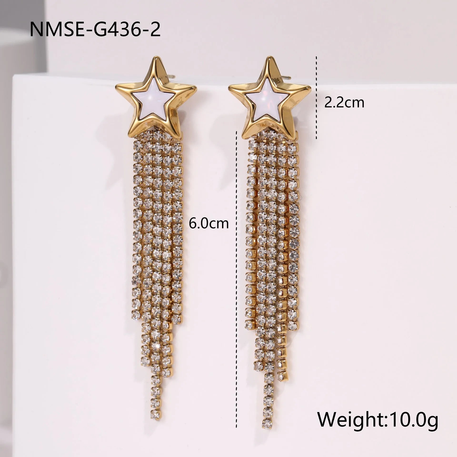 Women's stainless steel drop earrings with heart shape, star charm and diamond tassel detailing in 18K electroplated finish