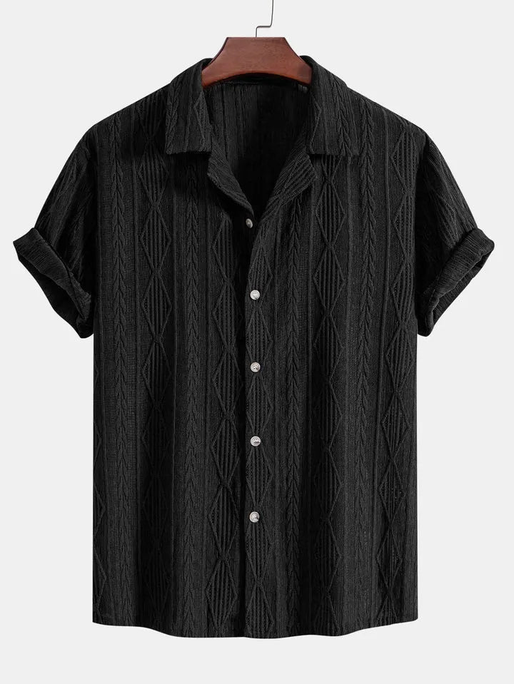 Man wearing a loose-fit black short sleeve casual cardigan for summer.