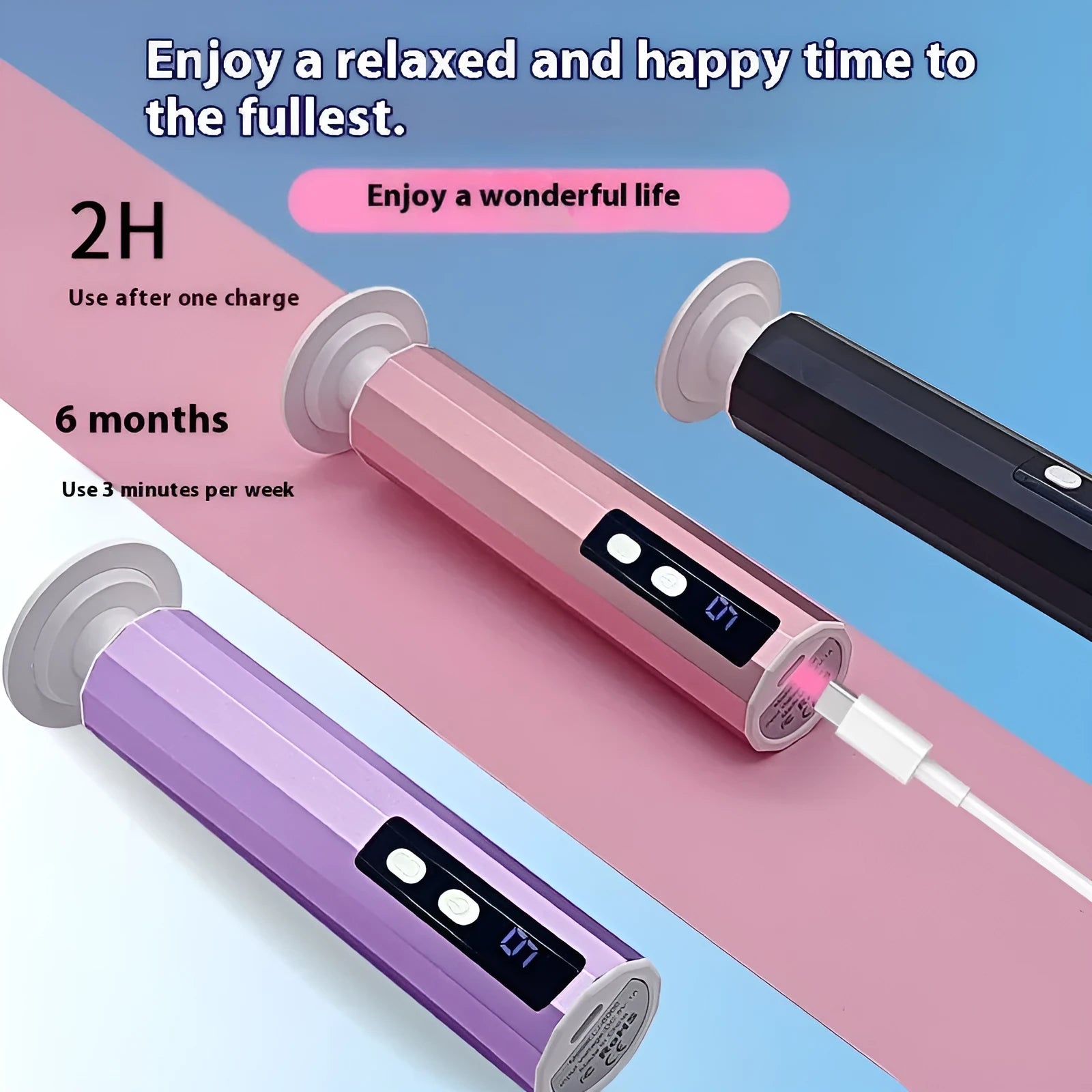 Pink electric callus remover tool with USB cable and pack of sandpaper grinding wheel attachments on a table.