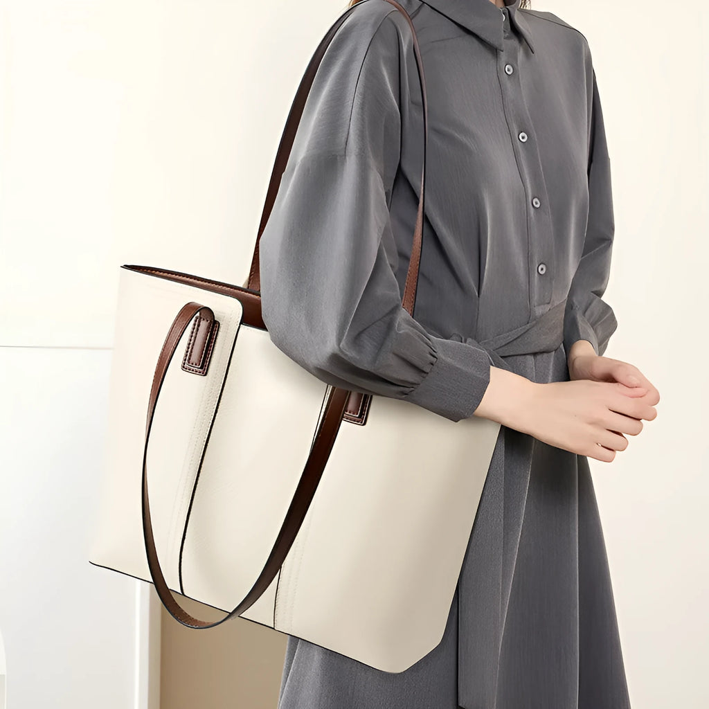 Women's black genuine leather crossbody shoulder bag with horizontal square shape and multiple internal compartments
