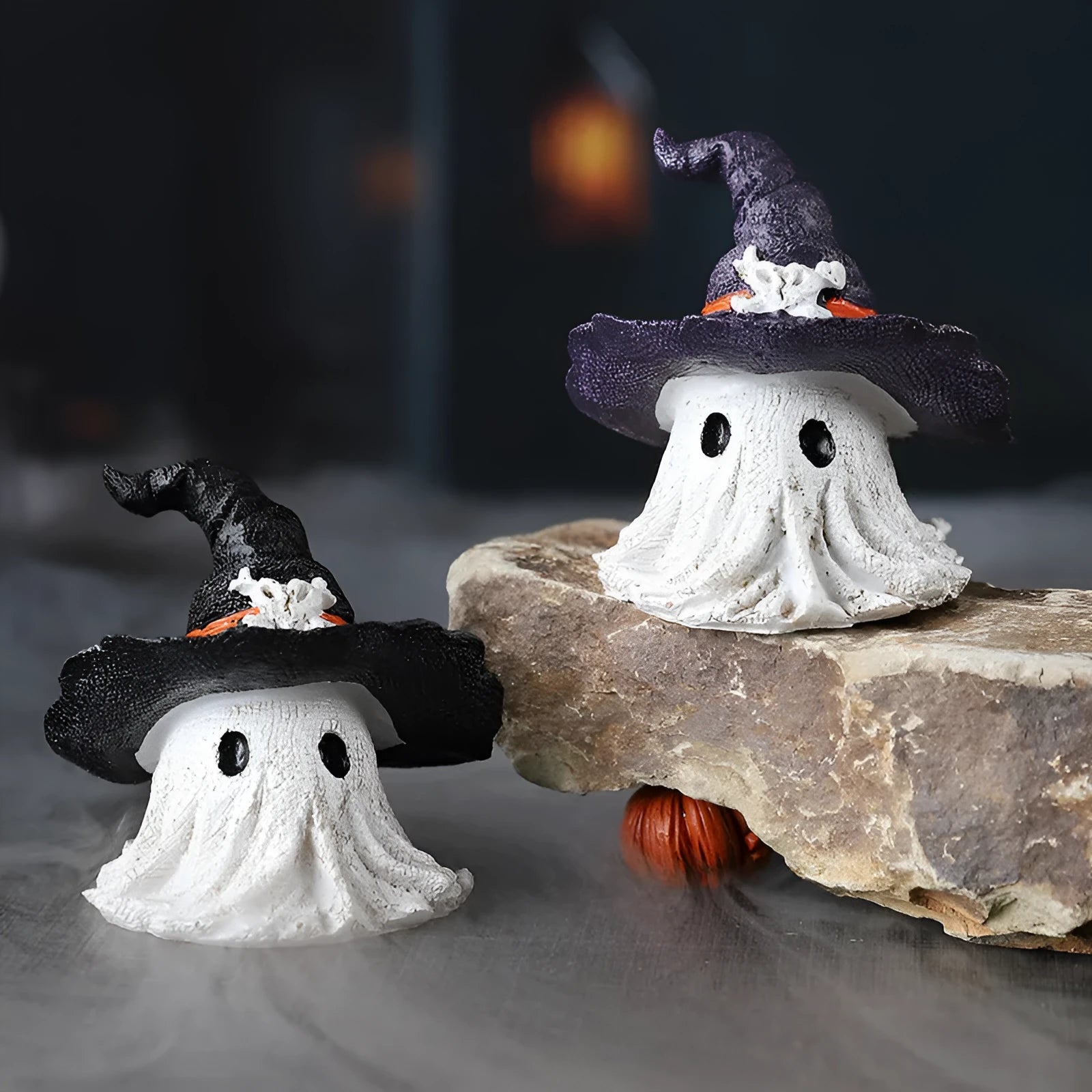 A purple resin wizard hat ornament for Halloween and Christmas decoration.