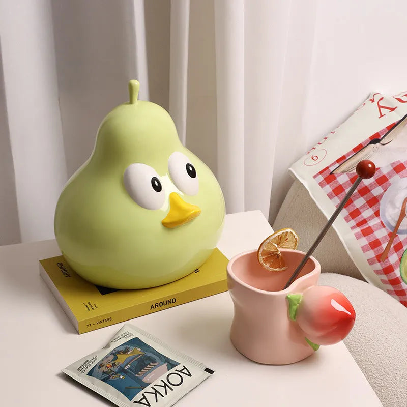 Cute pear-shaped ceramic tissue box in black or green colour for desktop tissue storage