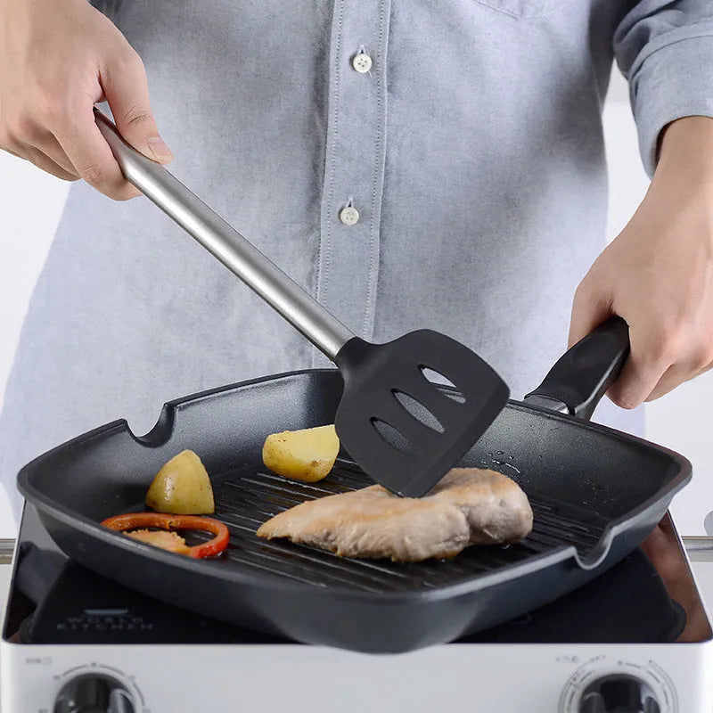 Black silicone kitchen utensil set with stainless steel handles showing 16 cooking tools