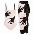 Women's patterned polyester bikini with attached sheer tulle skirt cover-up.