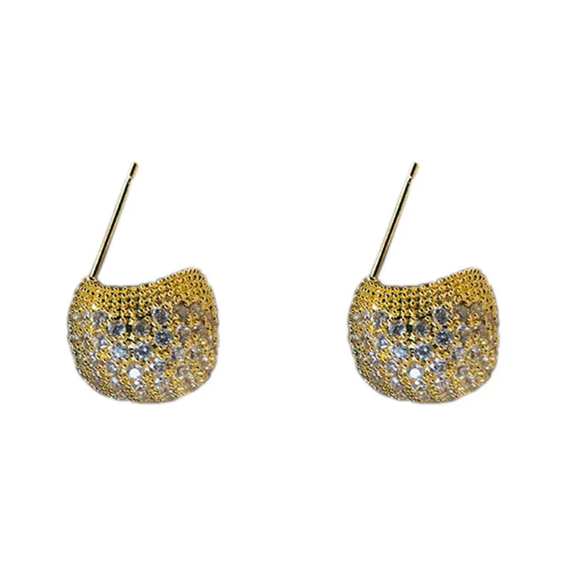 Golden beans drop-shaped earrings with full diamond embellishment and geometric design