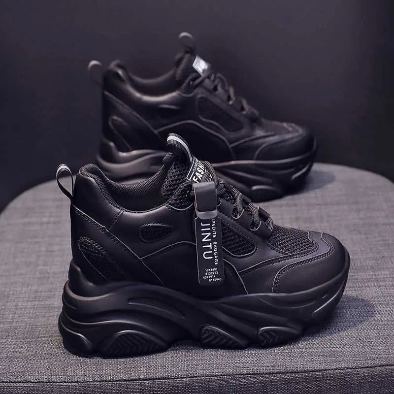 Women's black platform casual shoes with mesh upper, hollow-out design, and a velvet lining.