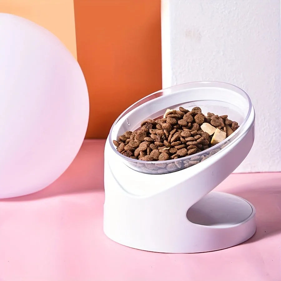 White elevated plastic cat food bowl with clear dish on a tilted stand