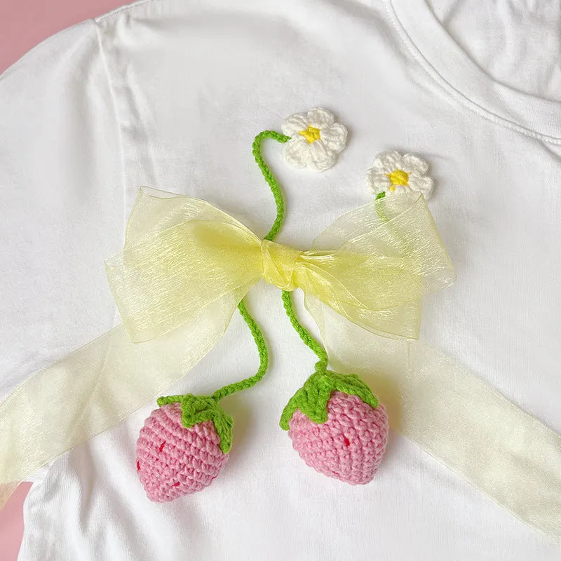 Handmade wool crochet strawberry pendant with 35cm cord in red or pink colour options
