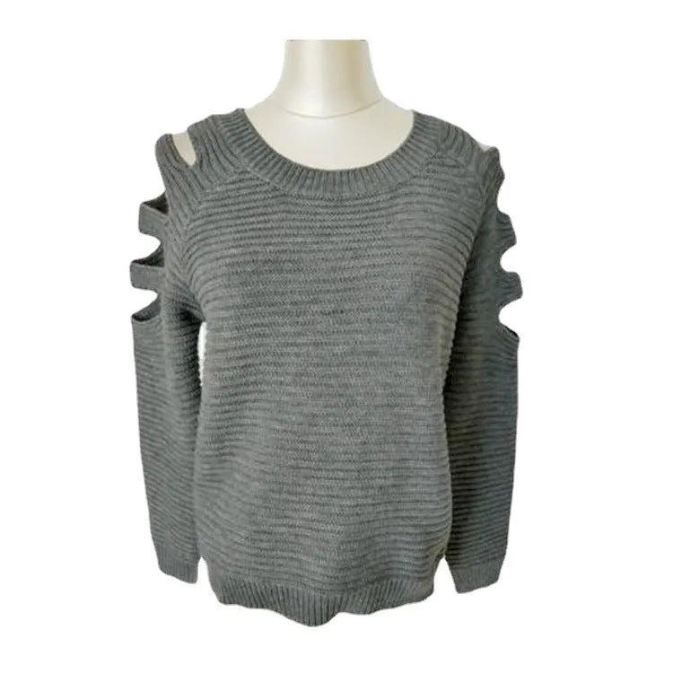 White women's knitted shirt with hollow-out crocheted pattern and long sleeves