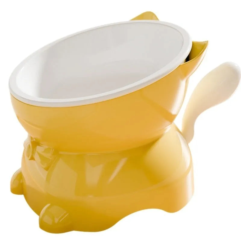 Stainless steel slanted anti-fall cat bowl in yellow on a non-slip base.