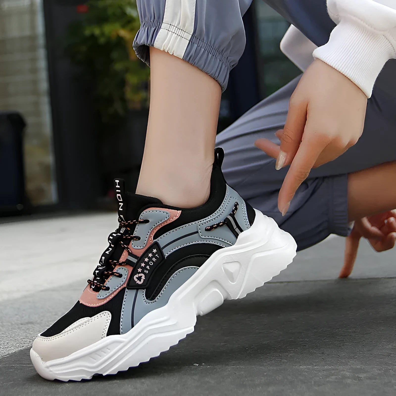 White women's casual sports shoes with mesh upper, thick PU sole, and lace closure.