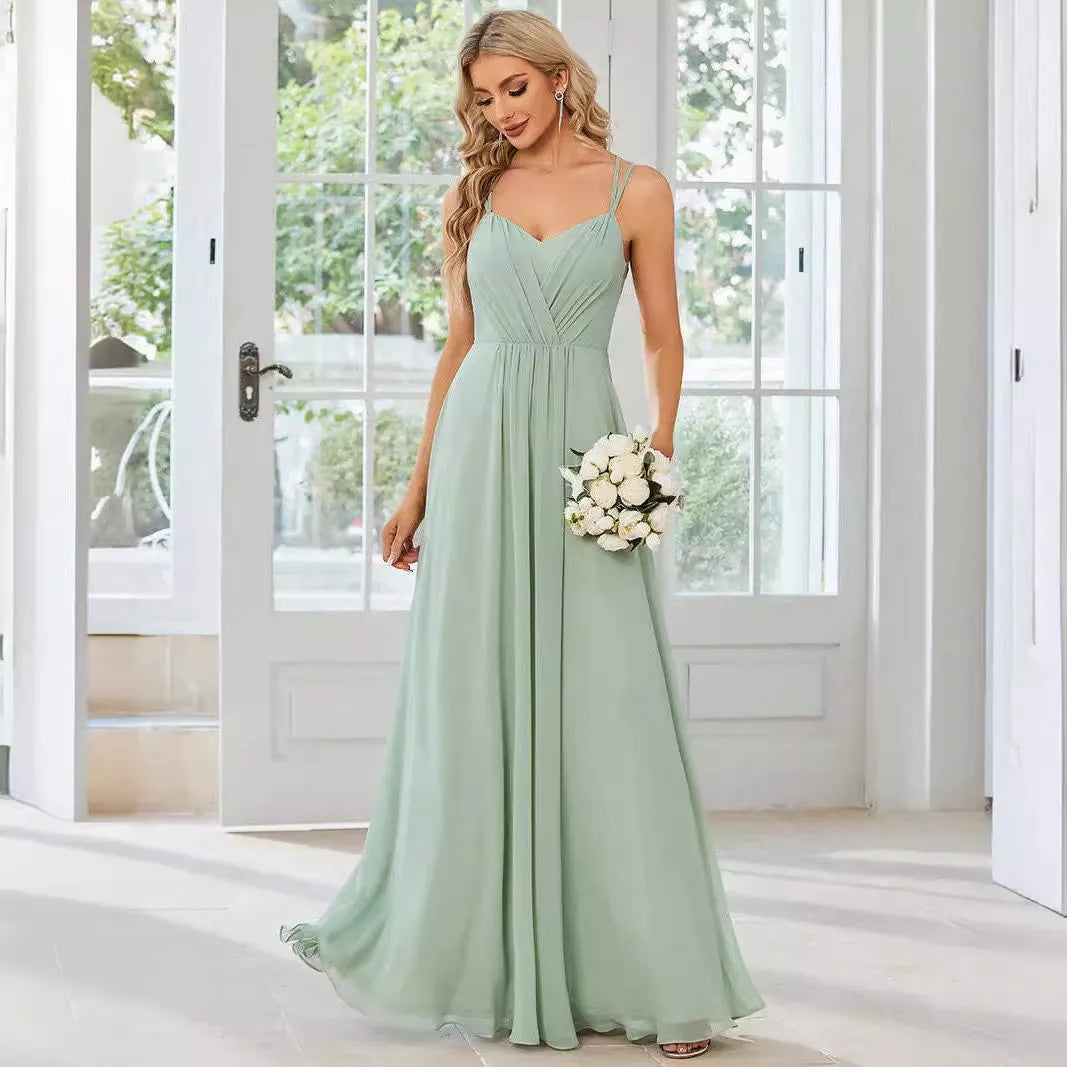 Women's sleeveless A-line pleated long dress in light green colour with sling neckline