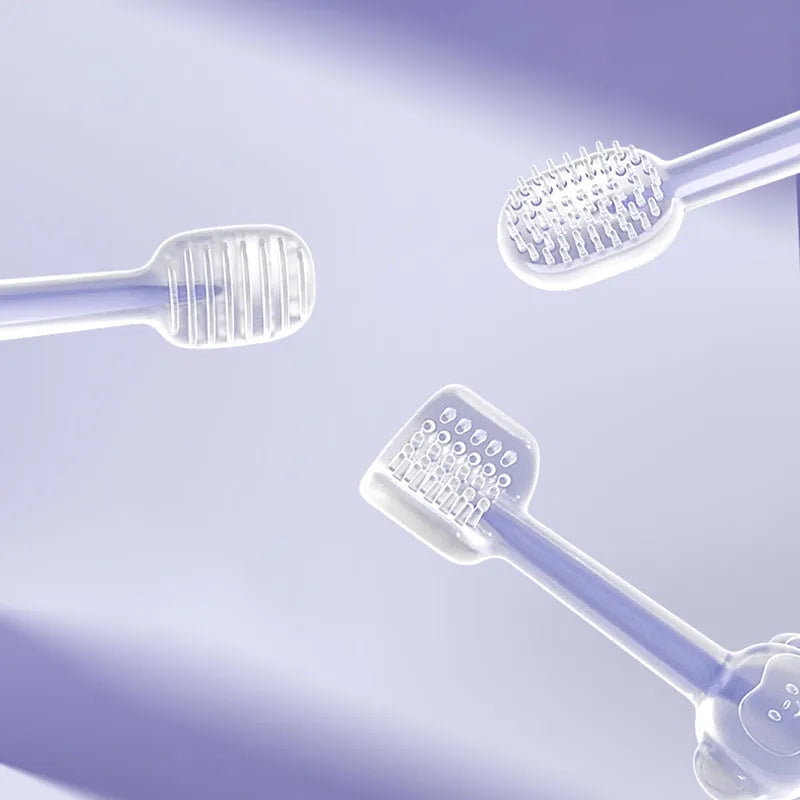 Blue, green, and purple silicone pet toothbrushes for dog and cat dental cleaning.