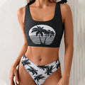 Women's coconut print bikini swimsuit with lace-up detail on a white background.