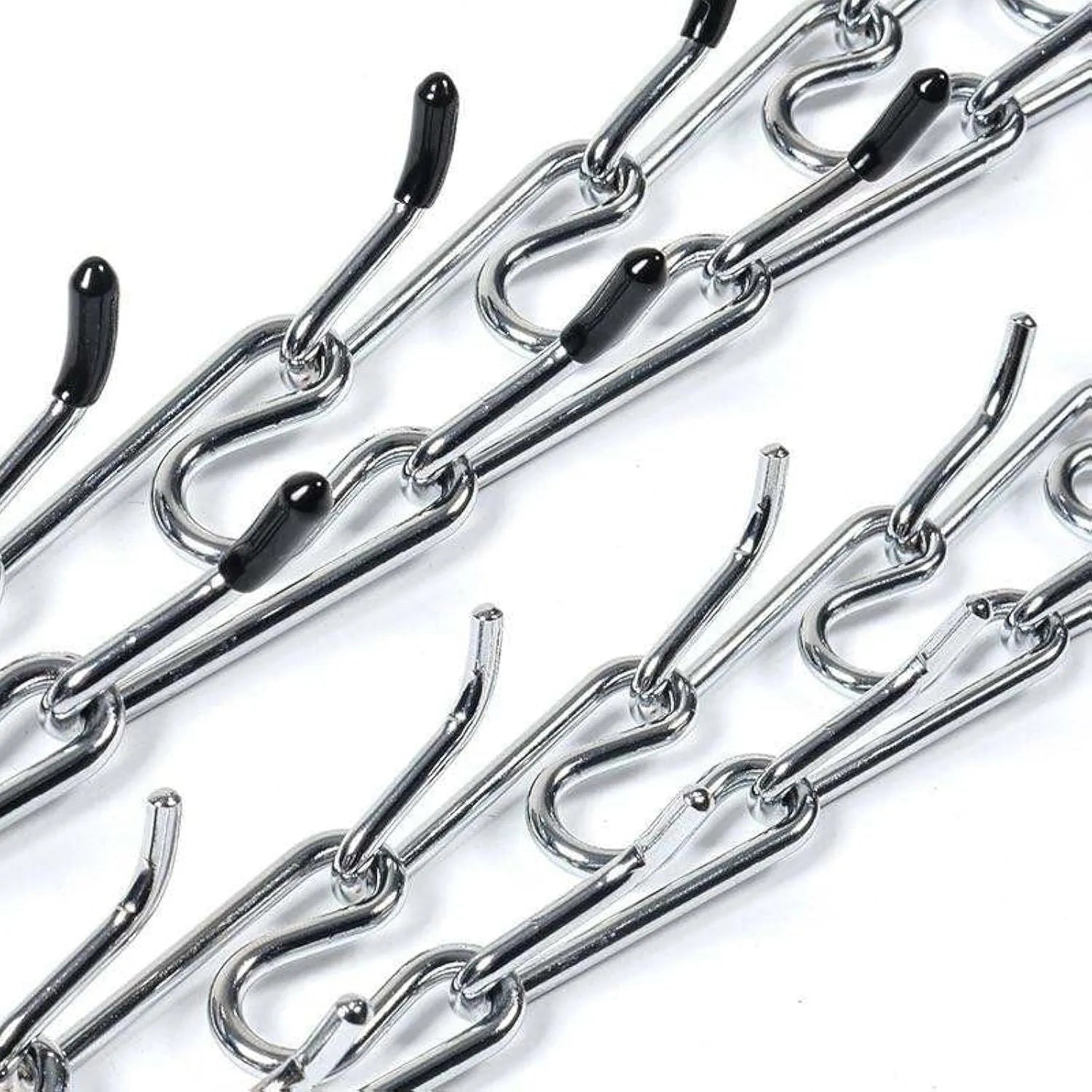 Stainless steel adjustable dog prong training collar with comfort rubber tips on a grey background