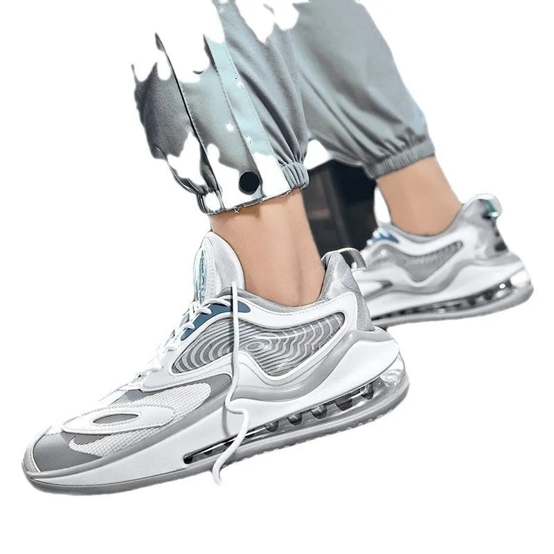 Men's Space Black and Space White casual shoes with air cushion and rubber sole.