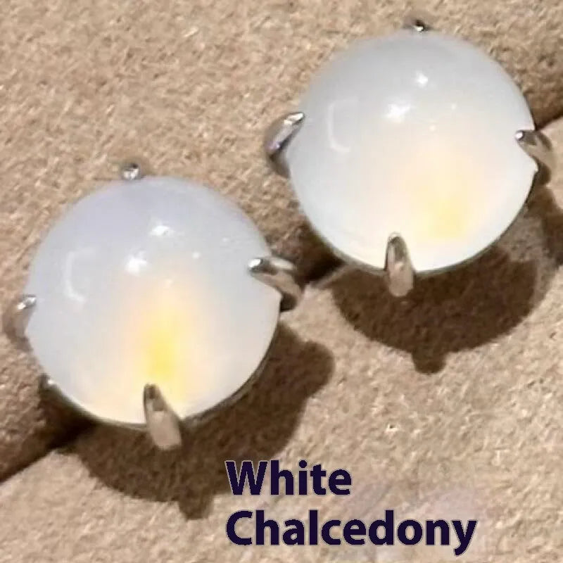 Chinese style chalcedony stud earrings with round egg surface stones in four claw settings