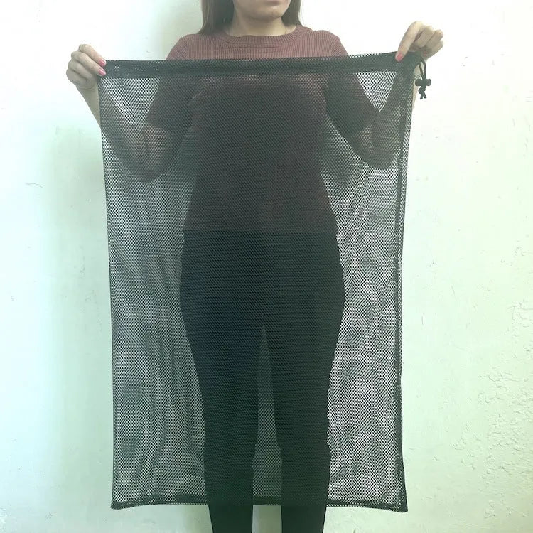 Black mesh drawstring storage bag with grid pattern, shown in three different sizes.