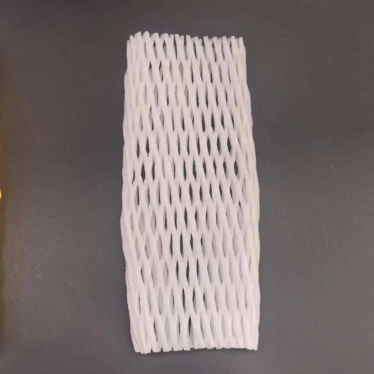 White foam protective net case for fruits showing mesh texture and size options