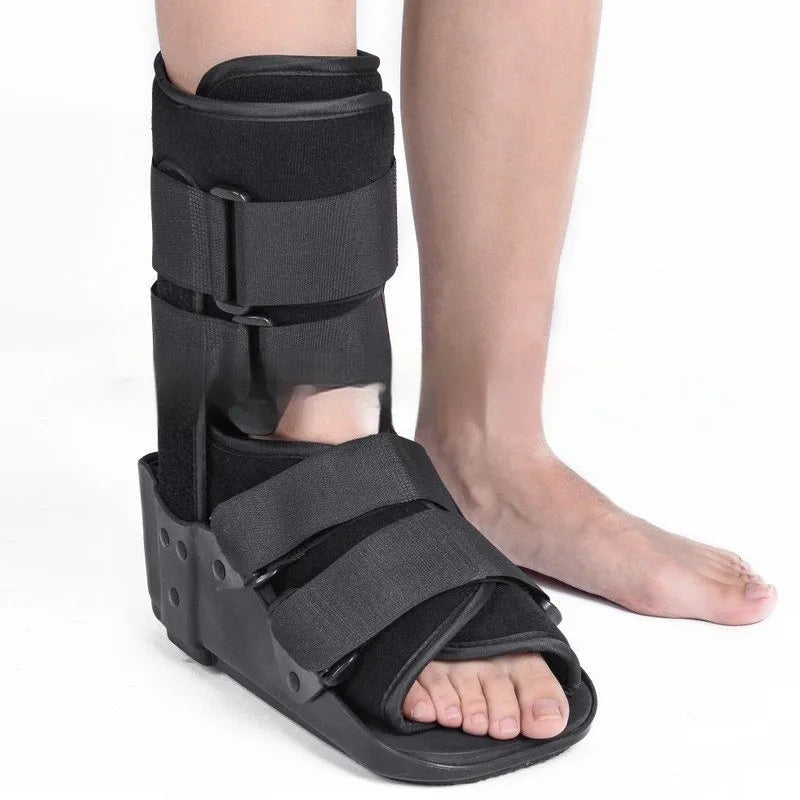 Black Achilles tendon rehabilitation walking boot with adjustable nylon straps and aluminium side supports