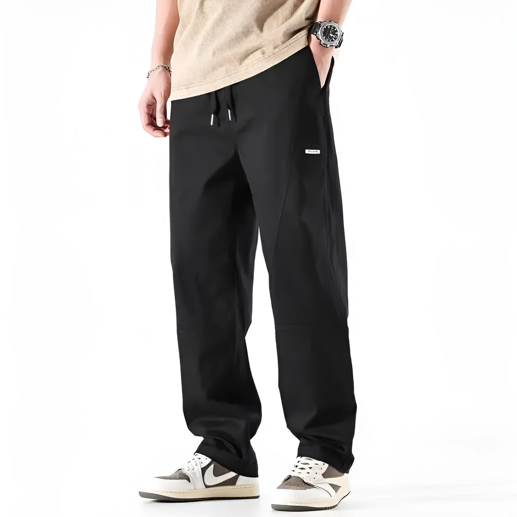 Cotton wide-leg trousers in milky white colour with a relaxed, straight-leg fit