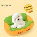 A soft flannelette hot dog bed for pets with a removable mat and anti-slip base, shown in a home setting.