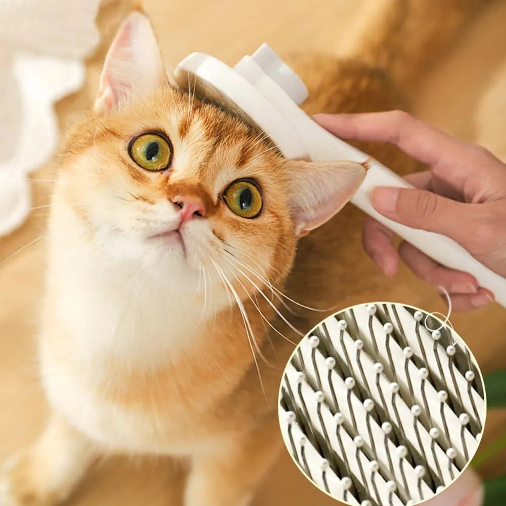Blue self-cleaning cat and dog grooming brush with rubber handle and metal pins.