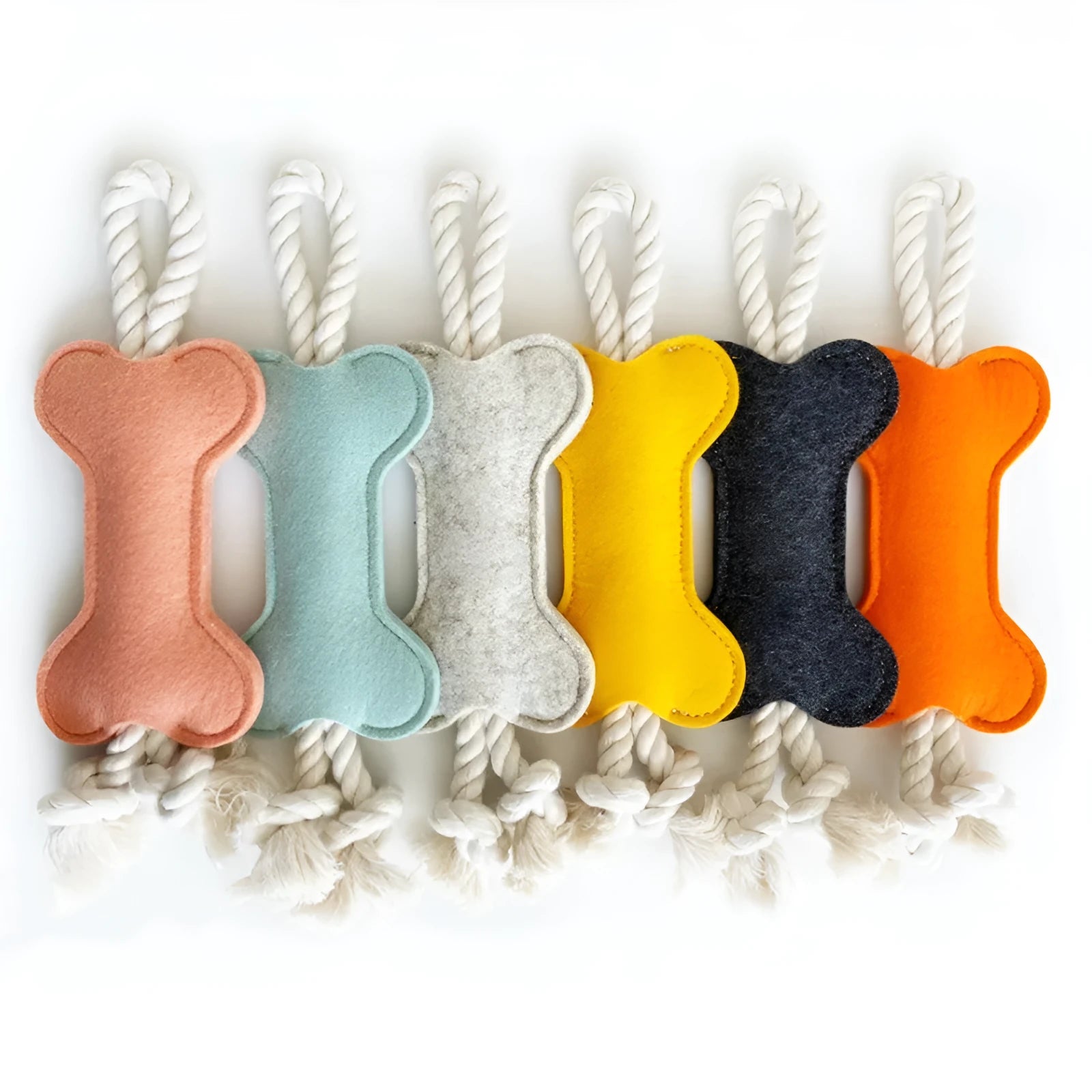 Bone-shaped dog chew toy with rope knot and felt construction in four colour options
