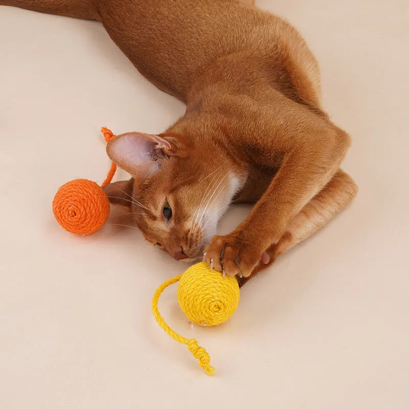 Cat teaser stick toy with catnip ball attachment, 255mm long with feather end.