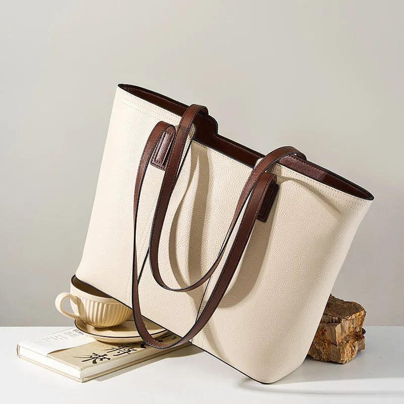 Women's black genuine leather crossbody shoulder bag with horizontal square shape and multiple internal compartments