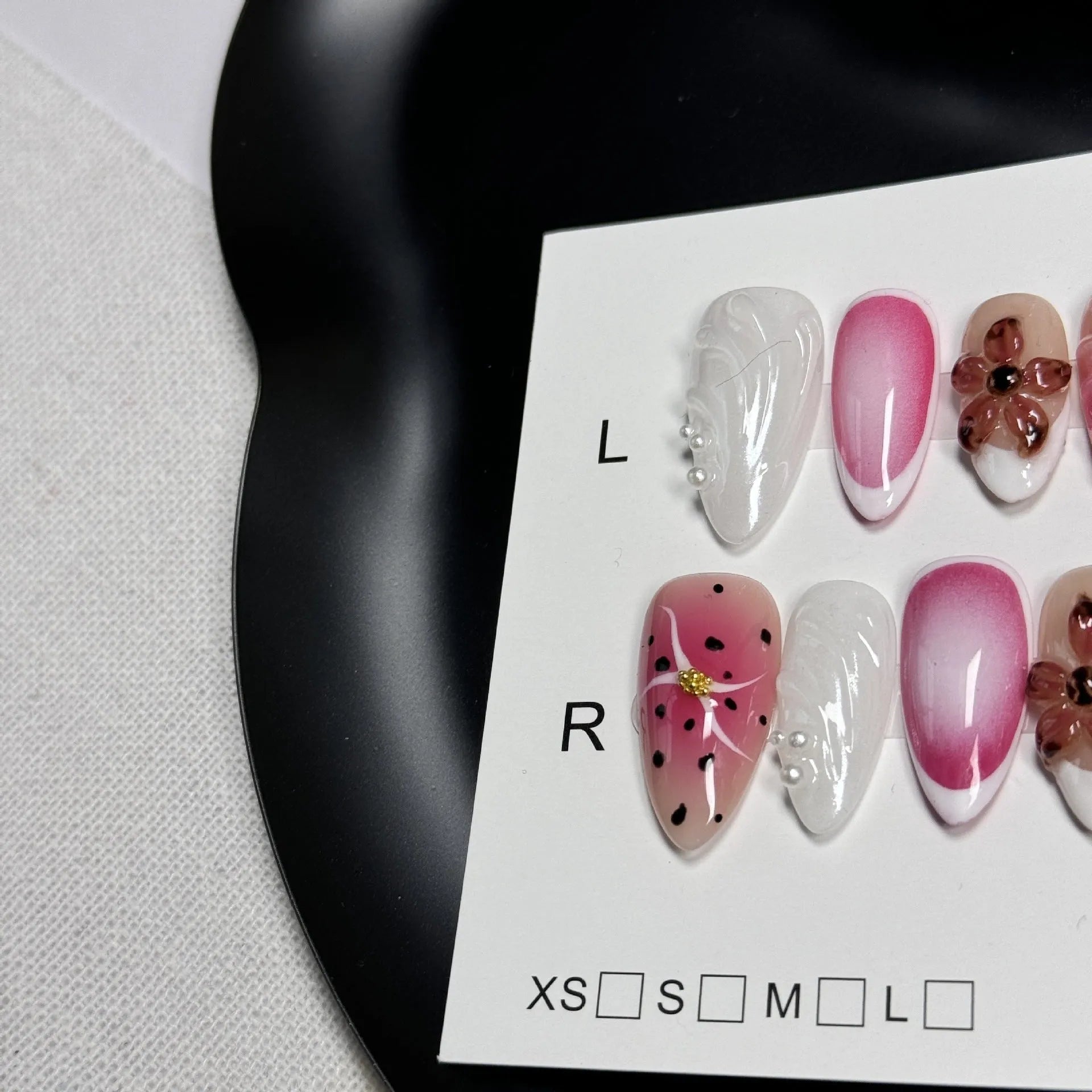 Hand-painted 3D carved nail art patches in embossed candy colours for almond-shaped nails.