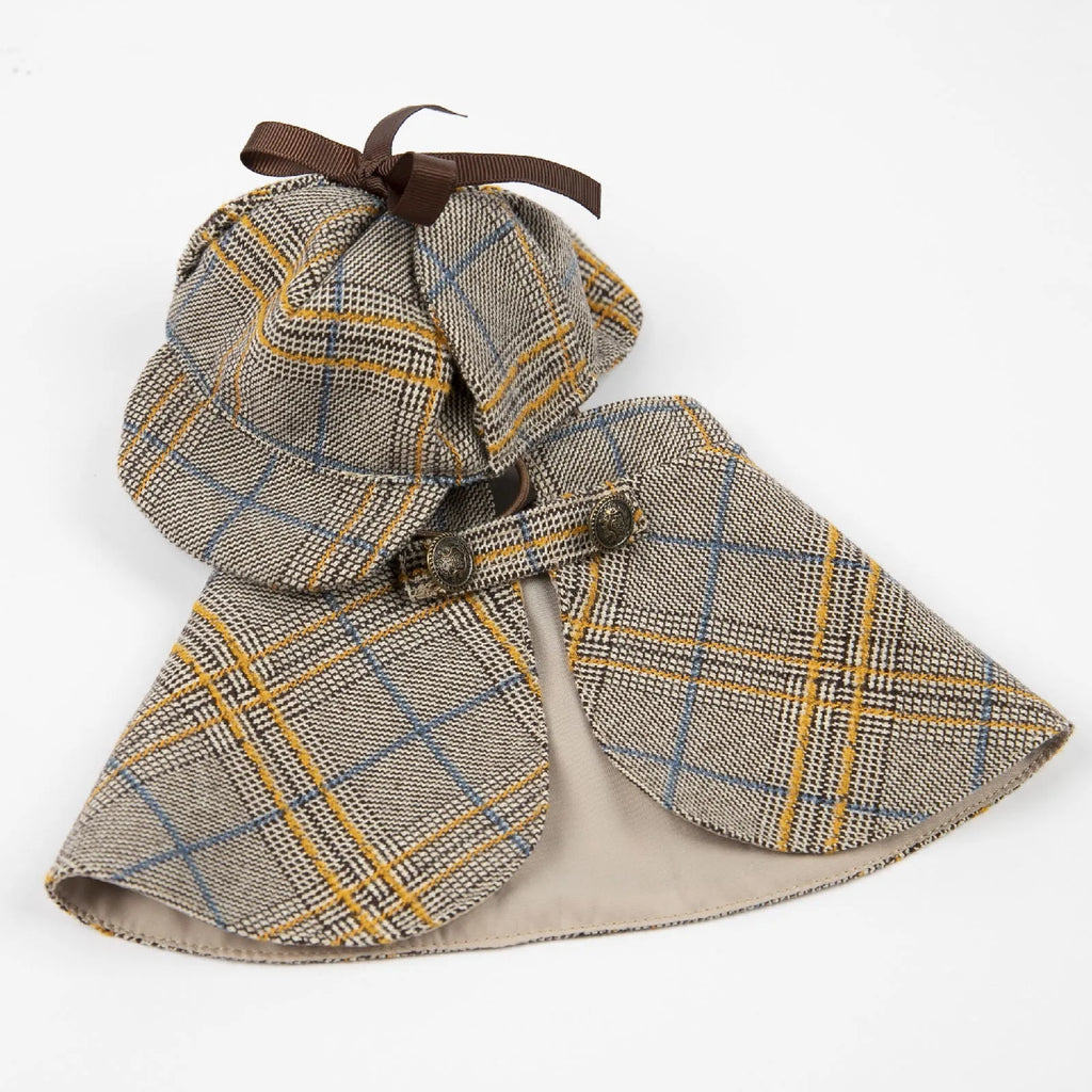 Camel-coloured cotton pet cloak with an adjustable hat shown on a model dog.