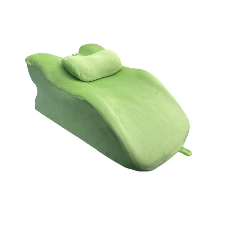 Stomach sleeping pillow for reading in bed shown in blue colour option
