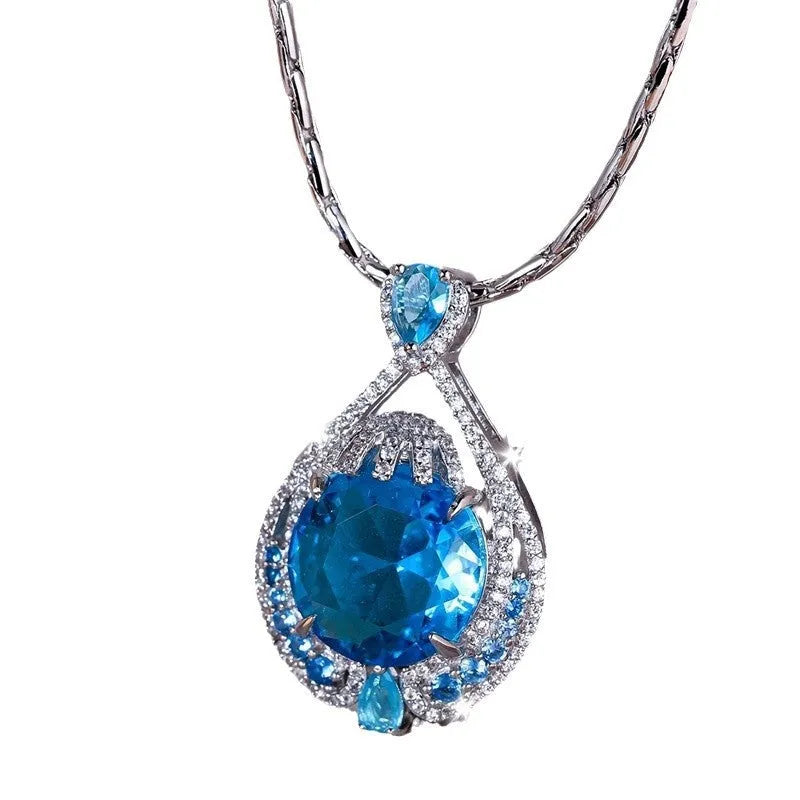 Blue geometric crystal pendant necklace with water wave chain and fireworks-cut gems