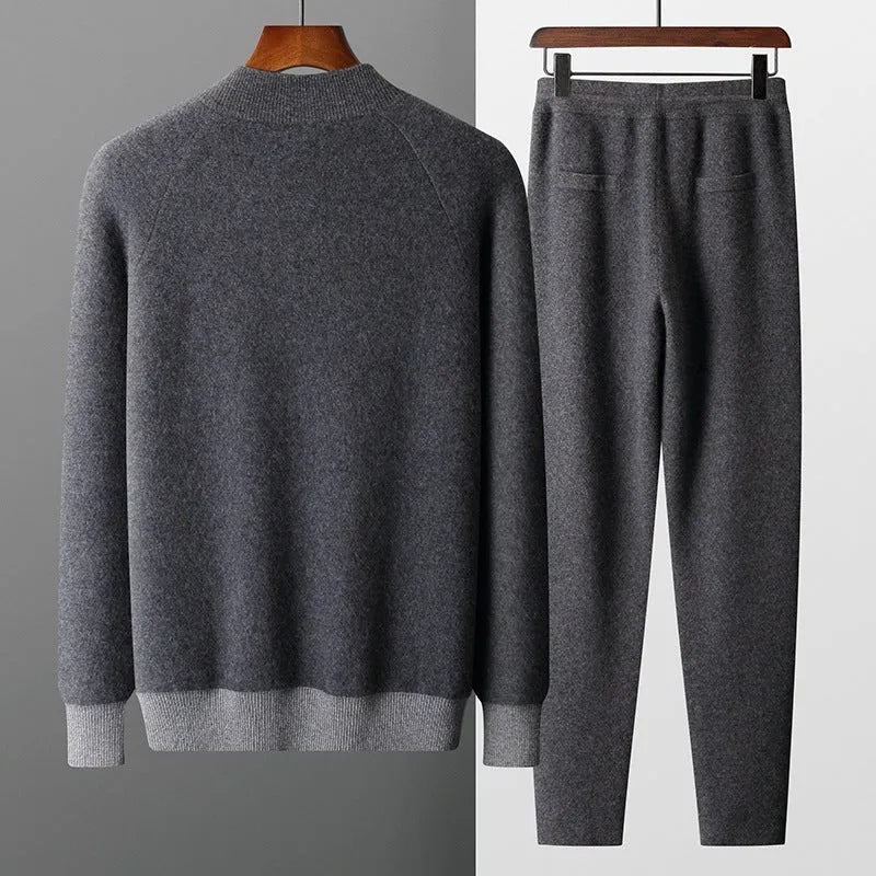 Men's navy blue cashmere wool blend knitted cardigan suit with half turtleneck top and matching trousers.