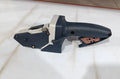 Blue aluminium alloy and plastic woodworking cutter with a measuring scale and one-press lock.