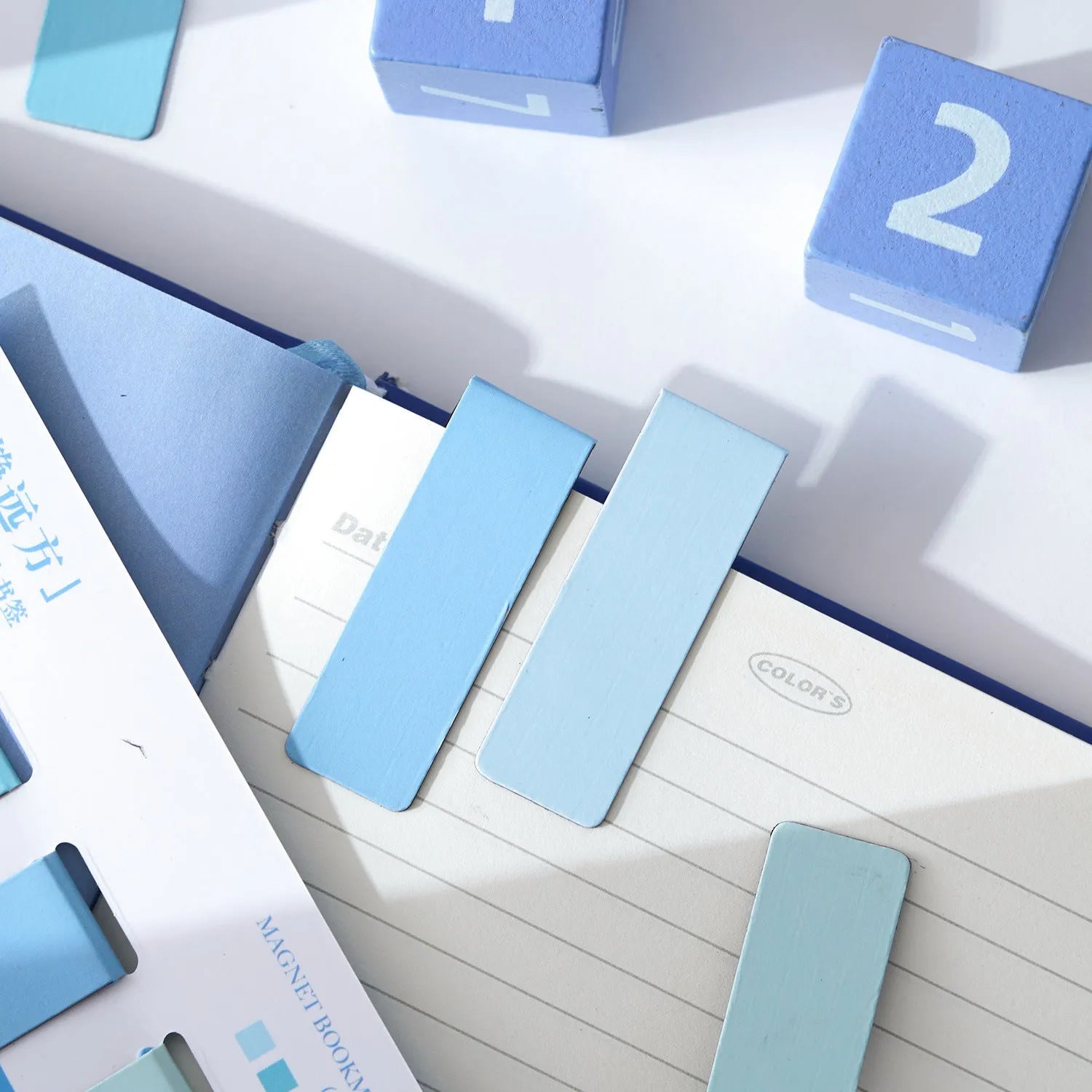 Set of four magnetic bookmarks showing Morandi colour block designs in soft gradients.