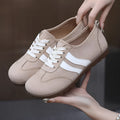 Women's vintage canvas sneakers in dark red with flat heel and round toe design
